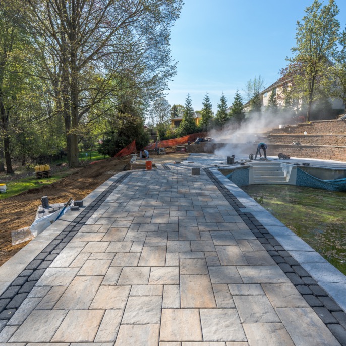 Paver patio and pool surround installation